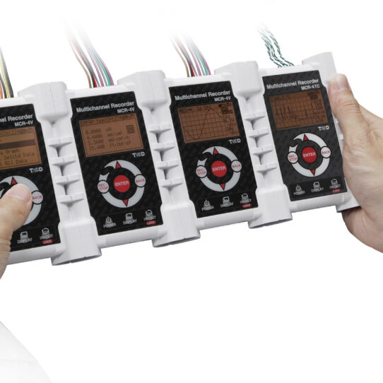 A person holding the MCR-4TC 4-Channel Thermocouple multi-channel data logger.