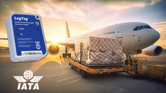 LogTag LT5GEO 5G Data Logger next to a cargo plane at sunrise.